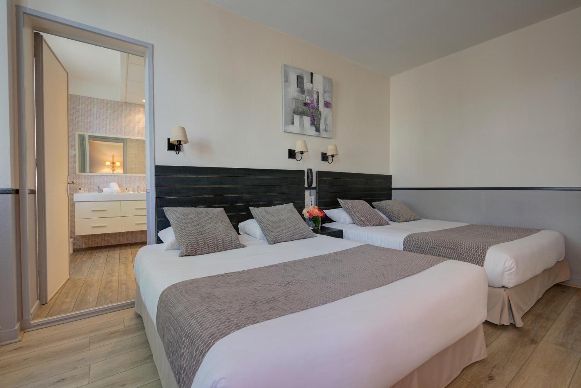 Chambre Quadruple avec Climatisation