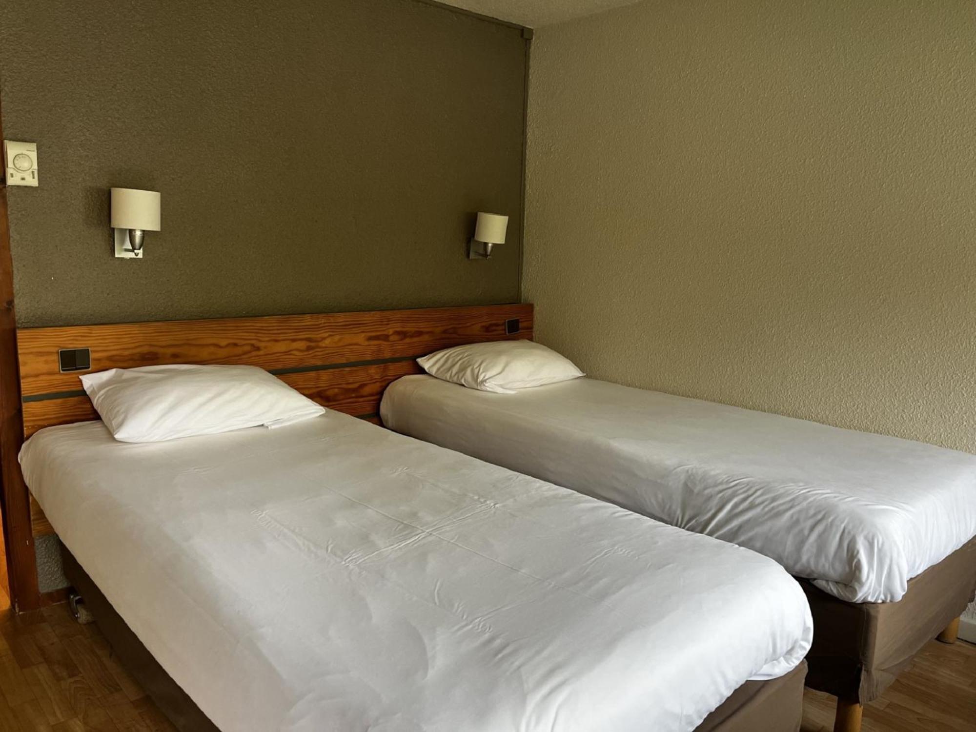 Triple Room 2 Single Beds 1 Junior Bed