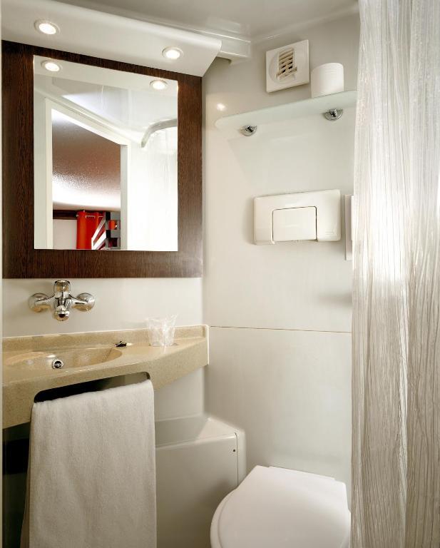 Chambre Triple (1 Lit Double et 1 Lit Simple)
