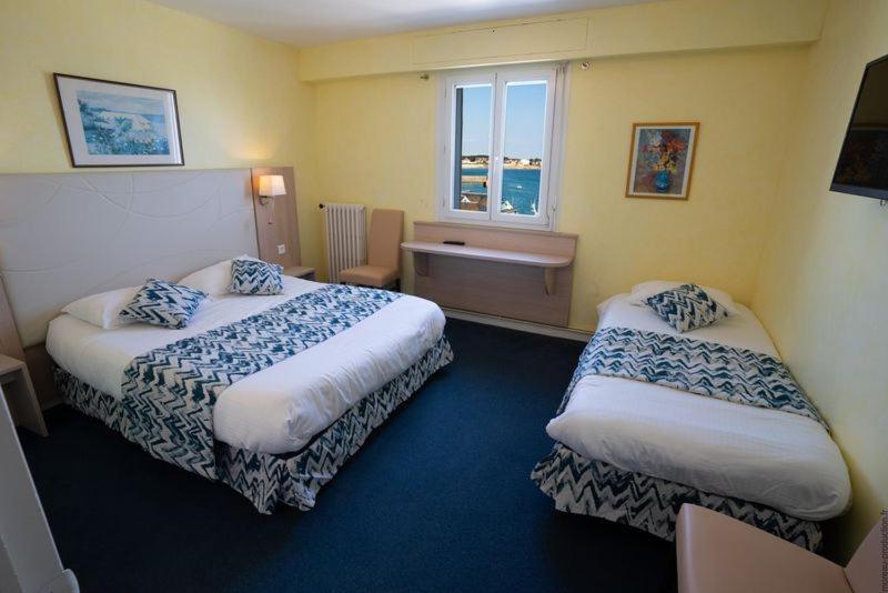 Dreibettzimmer mit Meerblick
