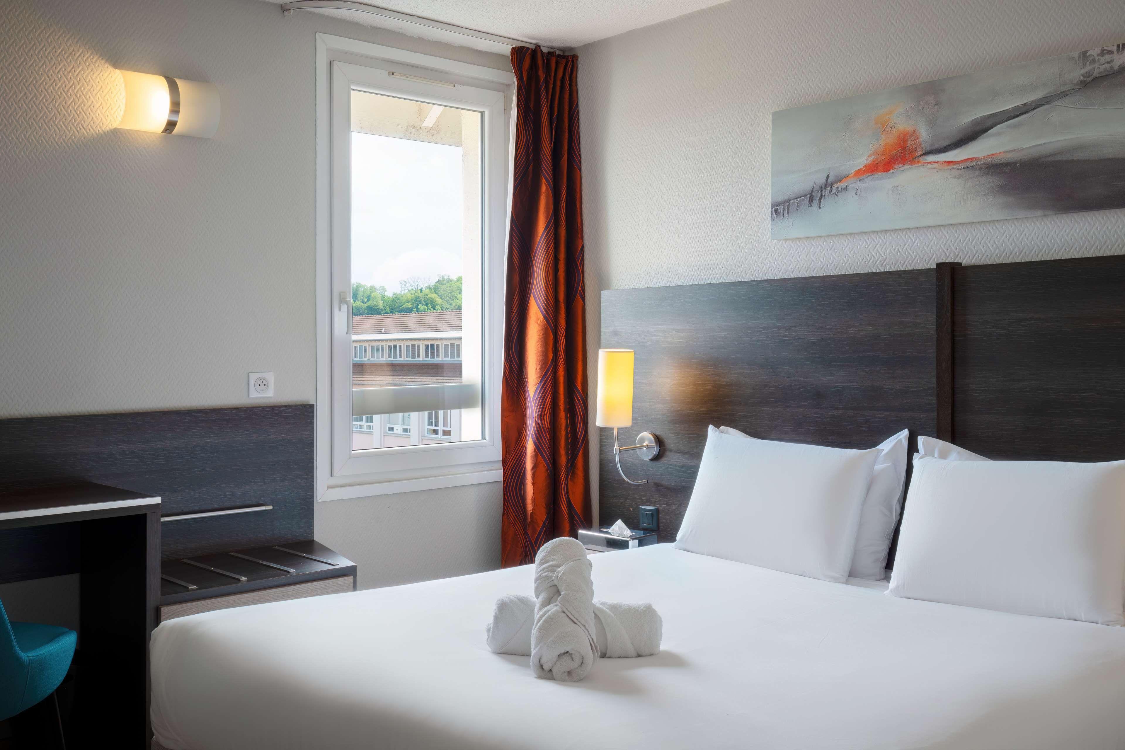 Quadruple Room One Double Bed Two Single Beds