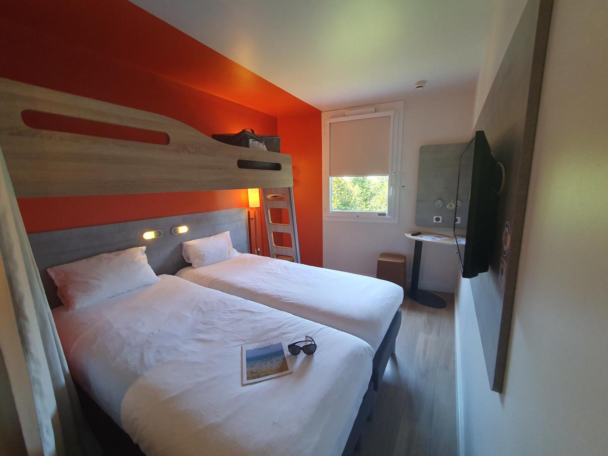 Triple Room Two Singles beds Extra Bed