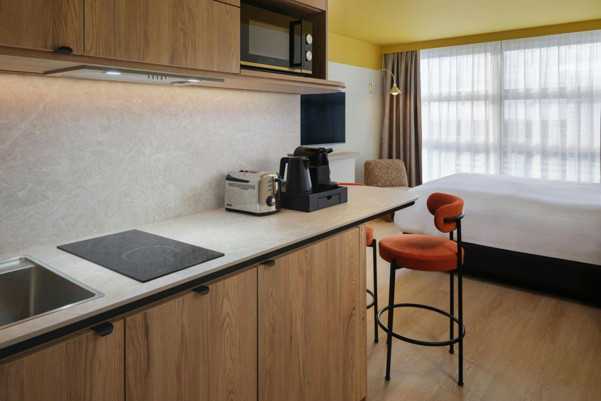 King Studio with One King Bed and City View - High Floor