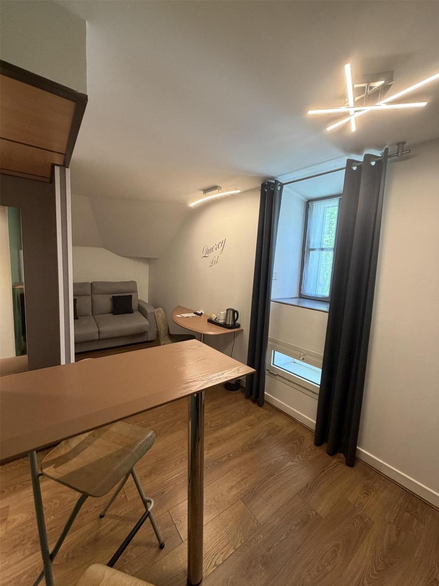 Deluxe Quadruple Room Queen Bed Kitchen