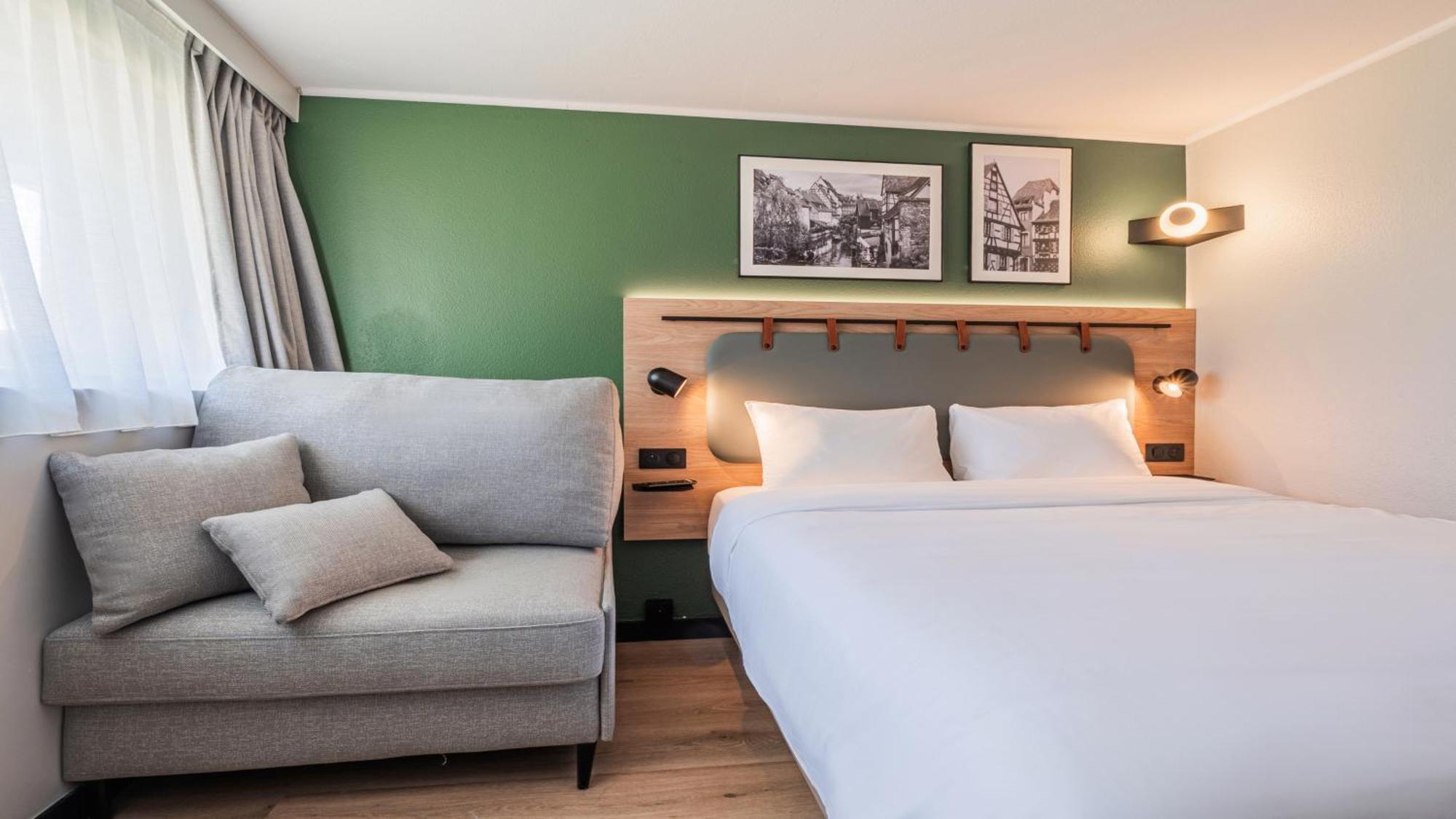 Standard Room One Queen Bed One Sofa Bed