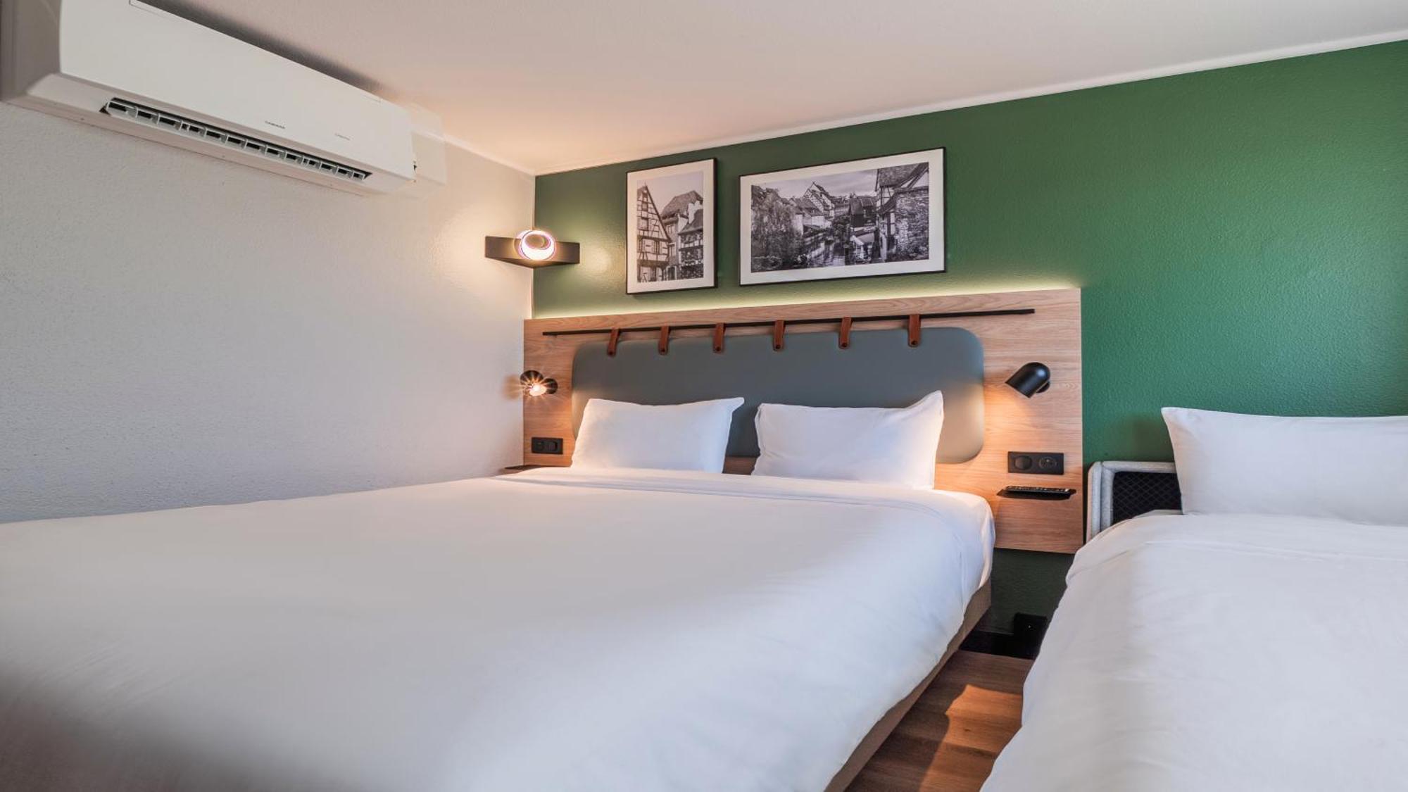 Standard Room One Queen Bed One Sofa Bed