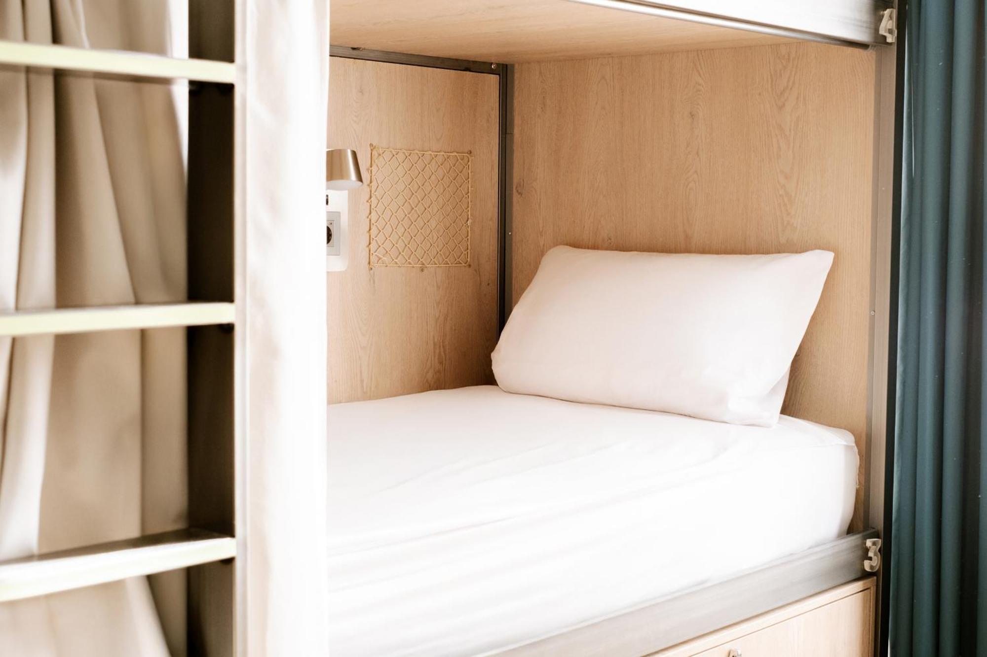 Cama en habitación compartida mixta de 8 camas