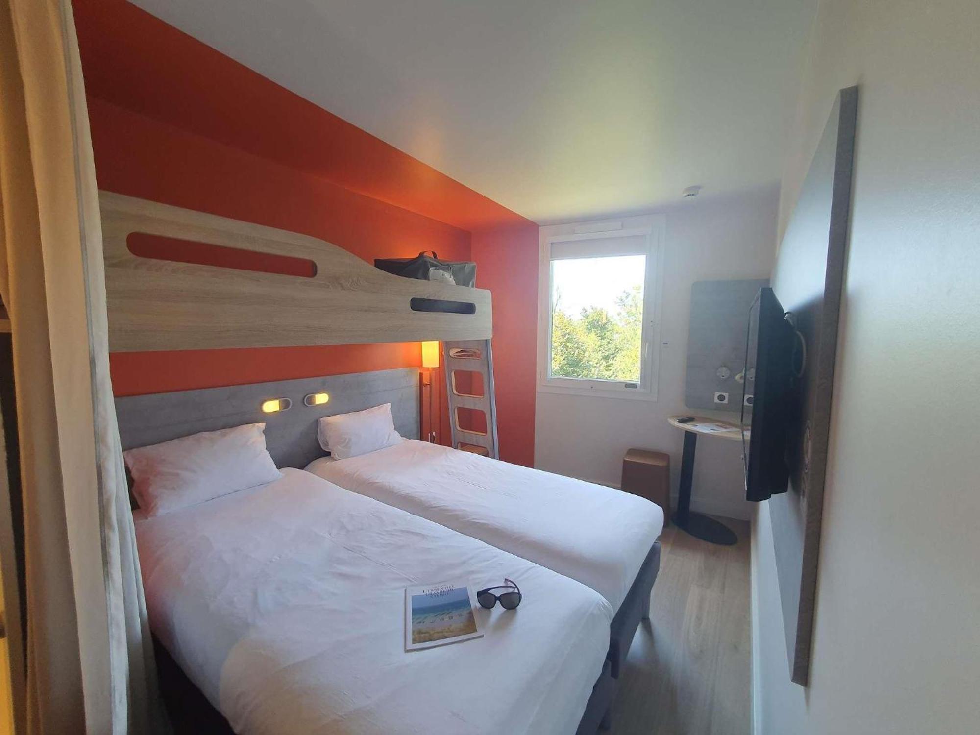 Triple Room Two Singles beds Extra Bed