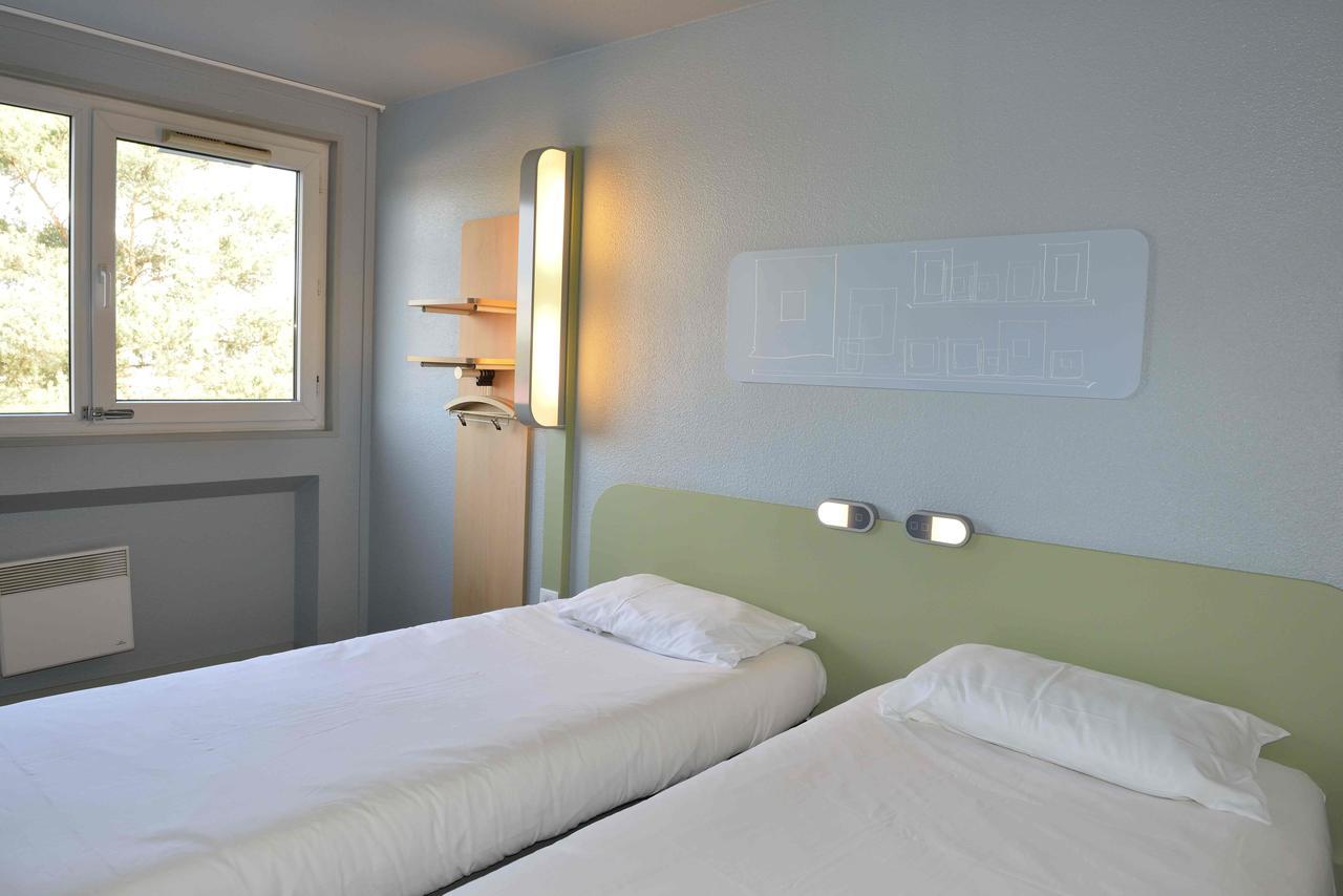 Tweepersoonskamer met 2 Aparte Bedden