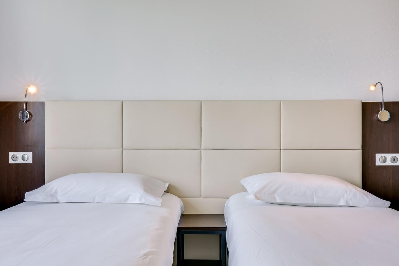 Tweepersoonskamer met 2 Aparte Bedden