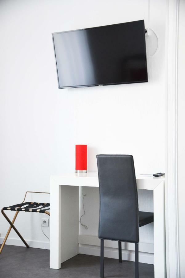 Chambre Quadruple Basique (2 Adultes + 2 Enfants)