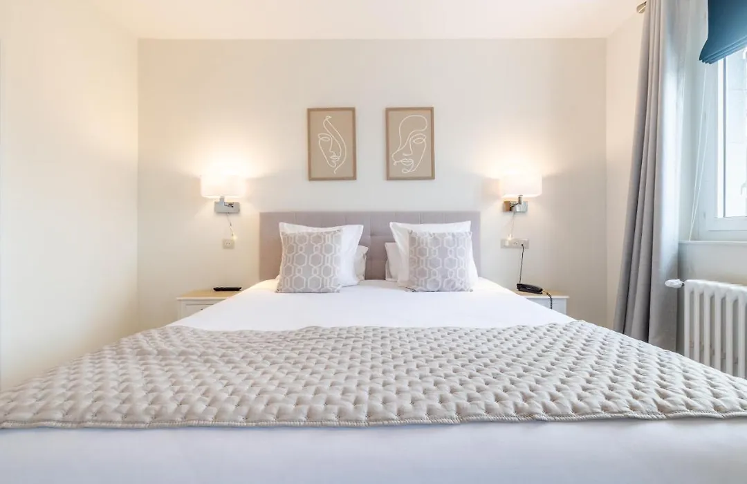 Hôtel Échappée en Baie - Chambres climatisées -Parking privé gratuit dont forfaits bornes électriques réservable-1